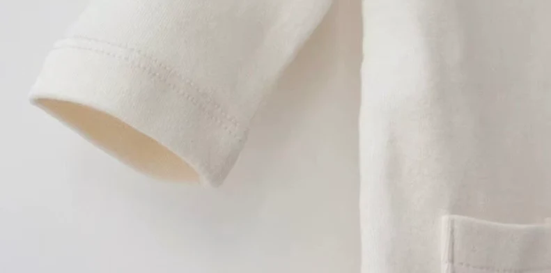 Combinaison en coton biologique bébé garçon – Ivoire