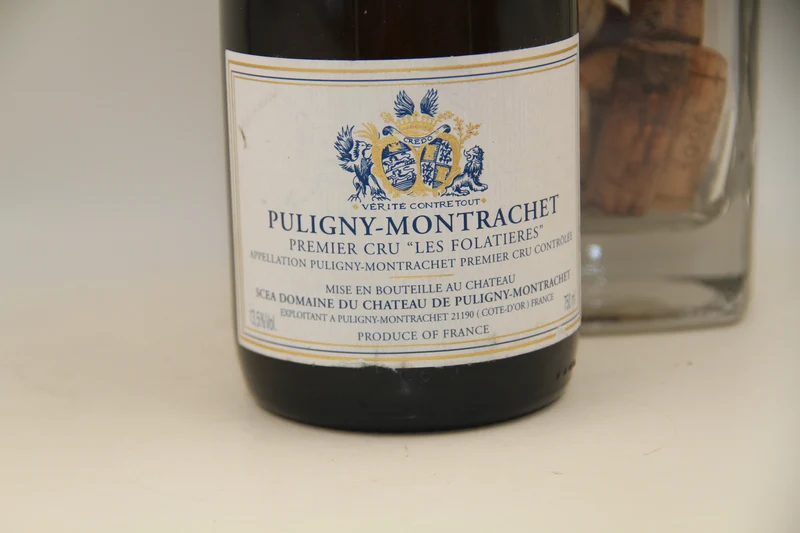 - Puligny Montrachet 1er Cru "Les Folatières" **1997 ** Chateau De Puligny Montrachet